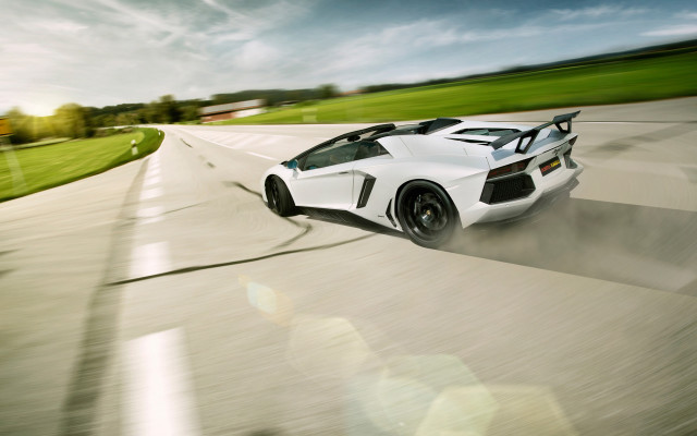 White sports car green field free wallpaper for desktop - medium preview image