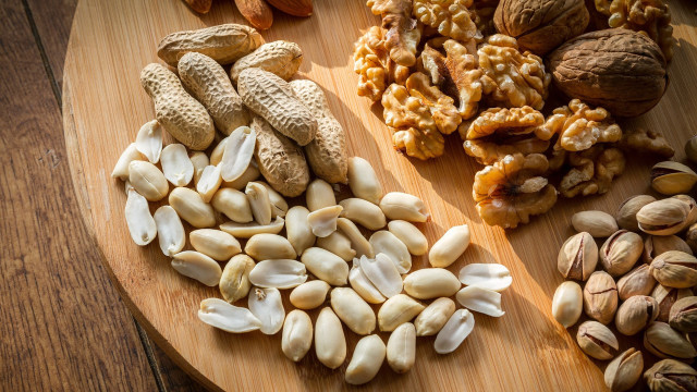 Nuts peanuts wooden plate food free wallpaper for desktop - medium preview image