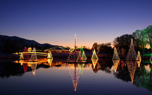 Glowing lake christmas lights mountains free wallpaper for desktop - medium preview image