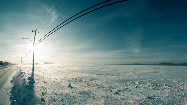 Snowy road telephone pole streetlight free wallpaper for desktop - medium preview image