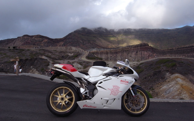 White motorcycle mountain road cloudy free wallpaper for desktop - medium preview image