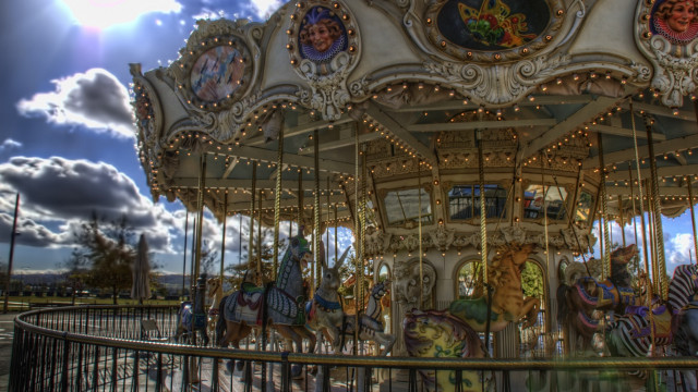Carousel horses sky clouds sun #2 free wallpaper for desktop - medium preview image