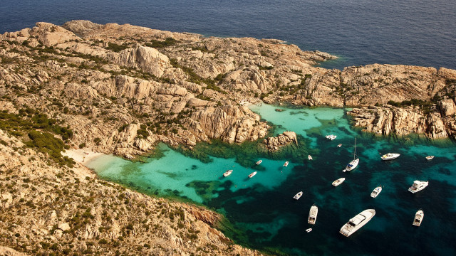 Boats lake rocks aerial scenery free wallpaper for desktop - medium preview image