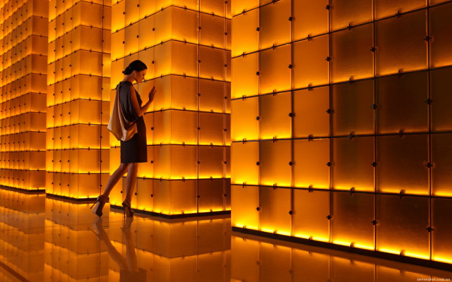 Woman orange lights cellphone backpack free wallpaper for desktop - medium preview image