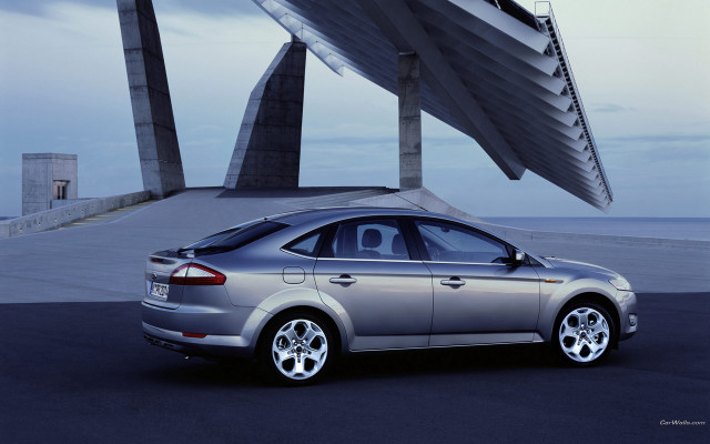 Silver car building sculpture clouds free wallpaper for desktop - medium preview image