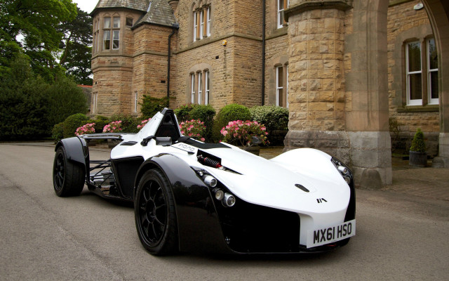 Race car clock tower arts free wallpaper for desktop - medium preview image