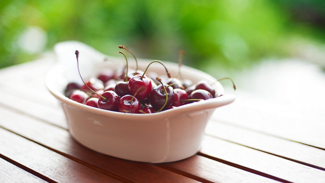 Bowl cherries wooden table sunlight free wallpaper for desktop - medium preview image
