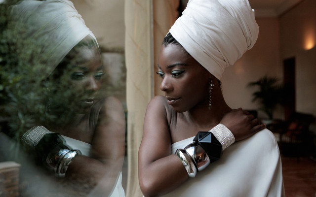 Afrofuturism woman whitedress turban mirror free wallpaper for desktop - medium preview image