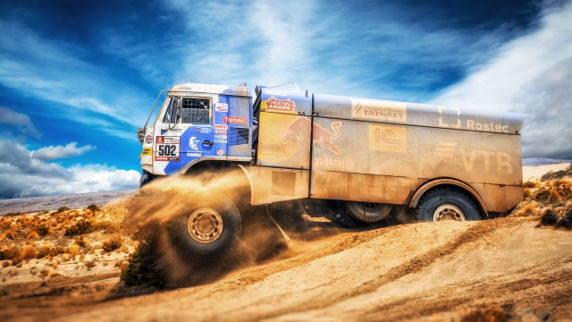 Truck desert mountains cloudy sky free wallpaper for desktop - medium preview image