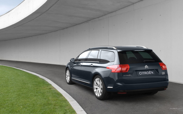 Blue car tunnel road grass free wallpaper for desktop - medium preview image