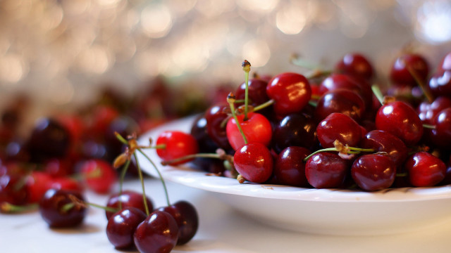 White plate cherries bokeh food free wallpaper for desktop - medium preview image