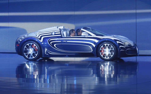 Blue sports car man driver free wallpaper for desktop - medium preview image