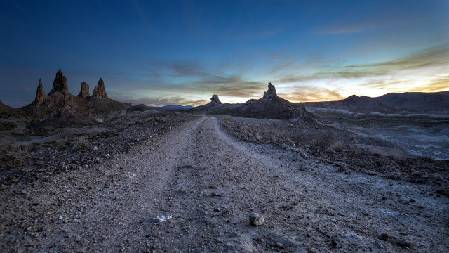 Dirt road rocks clouds mountains free wallpaper for desktop - medium preview image
