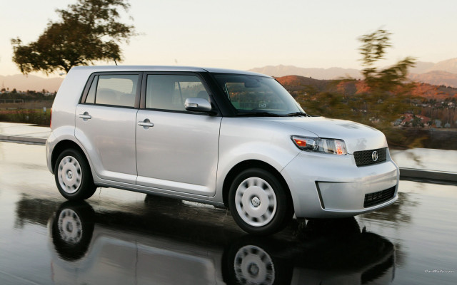 White car wet road mountains free wallpaper for desktop - medium preview image