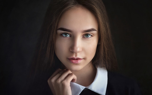 Blue eyes black sweater portrait free wallpaper for desktop - medium preview image