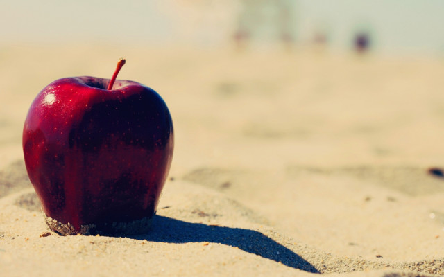 Red apple beach sand shadows free wallpaper for desktop - medium preview image