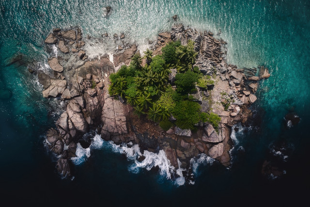 Aerial rocky island tree water free wallpaper for desktop - medium preview image