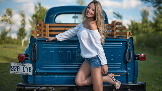 Blonde woman blue truck denim free wallpaper for desktop - medium preview image