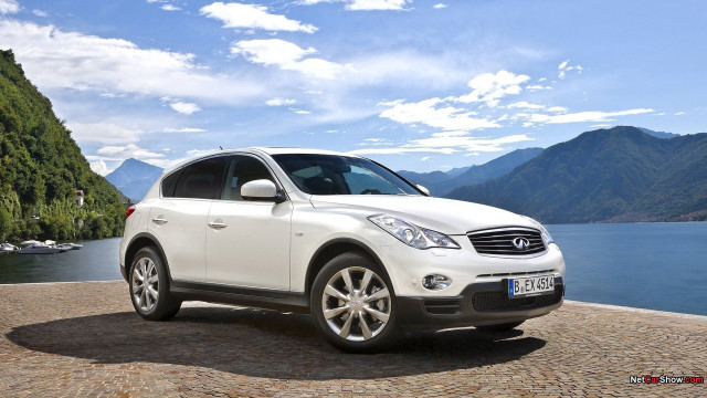 White car cobblestone road mountains free wallpaper for desktop - medium preview image