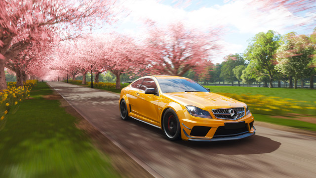 Yellow car pink flower trees free wallpaper for desktop - medium preview image