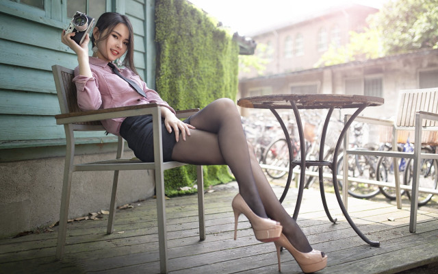 Woman sitting camera bicycle fashion free wallpaper for desktop - medium preview image