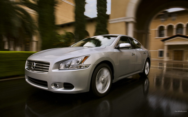 Silver car street building clock free wallpaper for desktop - medium preview image