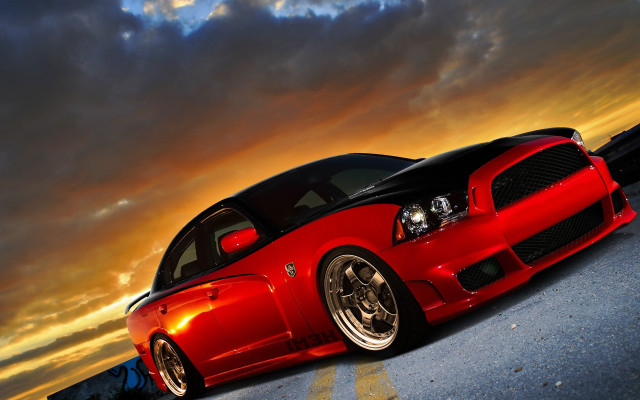 Red car cloudy sky dusk free wallpaper for desktop - medium preview image