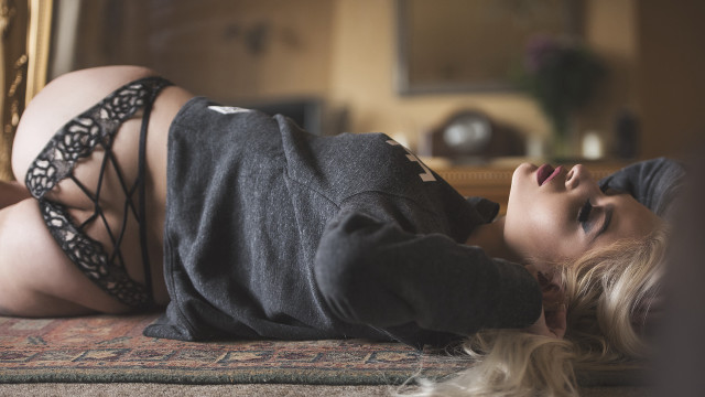 Woman laying on rug blonde free wallpaper for desktop - medium preview image
