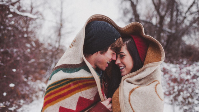 Man woman blanket snow smiling free wallpaper for desktop - medium preview image