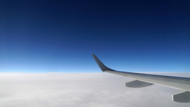 Airplane wing clouds blue sky free wallpaper for desktop - medium preview image