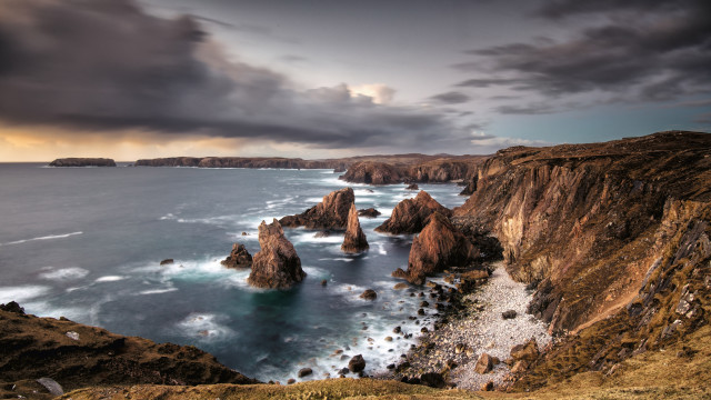 Rocky cliff water cloudy sky #7 free wallpaper for desktop - medium preview image