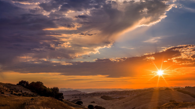 Sunset hilly landscape cows crepuscular free wallpaper for desktop - medium preview image