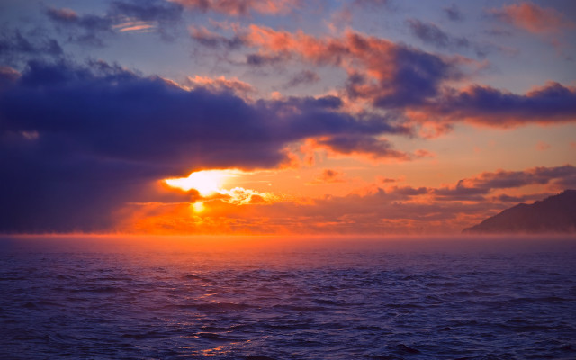 Sunset ocean boat mountain clouds free wallpaper for desktop - medium preview image