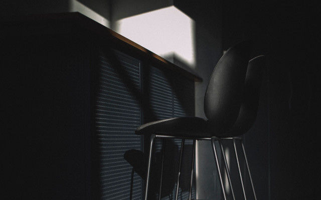 Dark room metal stool backlit free wallpaper for desktop - medium preview image