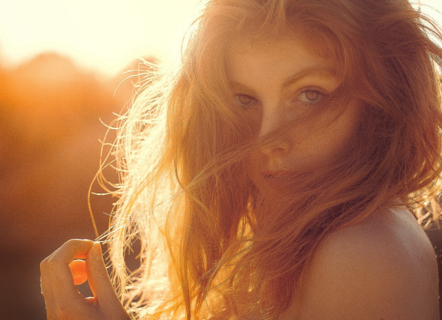 Red haired woman cellphone serious free wallpaper for desktop - medium preview image