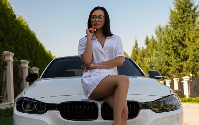 Woman sitting white car posing free wallpaper for desktop - medium preview image