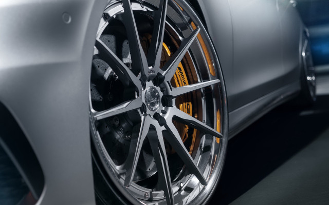 Car wheel closeup blue background free wallpaper for desktop - medium preview image