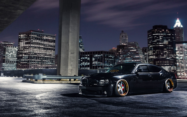 Black car city skyline bridge free wallpaper for desktop - medium preview image