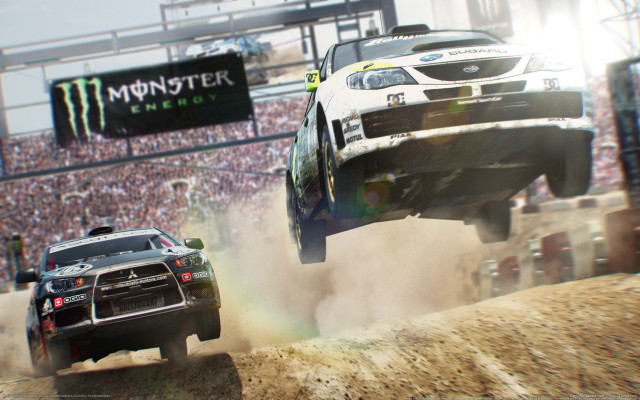 Two cars jumping dirt hill free wallpaper for desktop - medium preview image