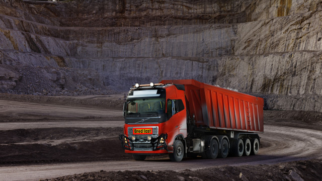 Red dump truck mountain dirt free wallpaper for desktop - medium preview image