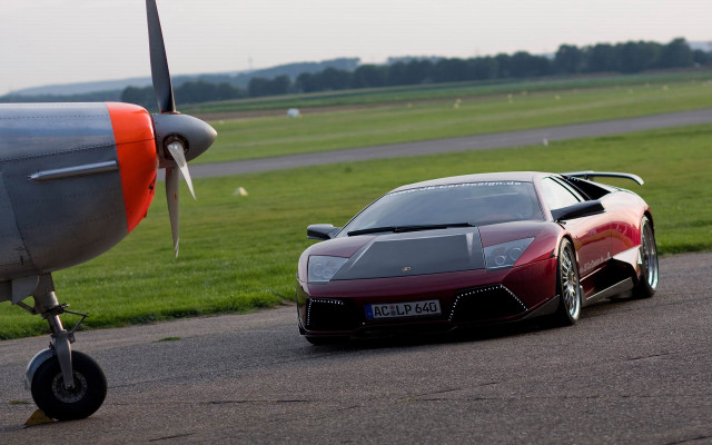 Red sports car runway plane free wallpaper for desktop - medium preview image