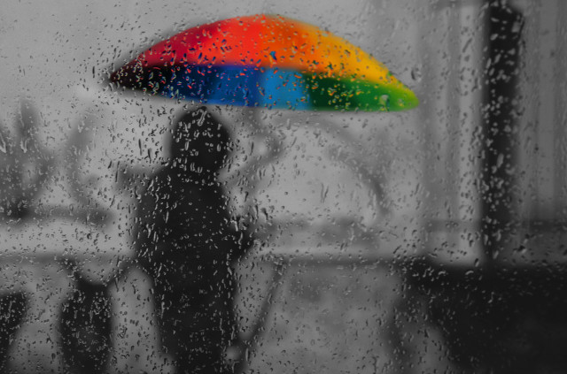 Rainy urban scene rainbow umbrella free wallpaper for desktop - medium preview image