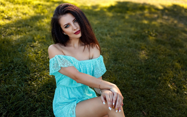Woman sitting grass blue dress free wallpaper for desktop - medium preview image