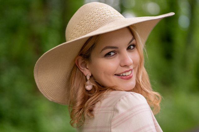 Woman smiling hat blonde outdoors free wallpaper for desktop - medium preview image