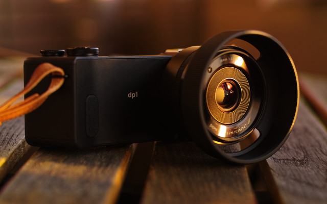 Camera wooden table thread blurry free wallpaper for desktop - medium preview image