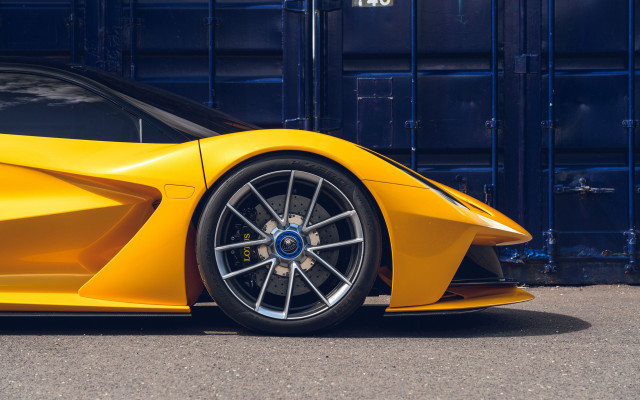 Yellow sports car blue container free wallpaper for desktop - medium preview image