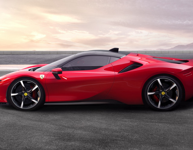 Red sports car mountains water free wallpaper for desktop - medium preview image