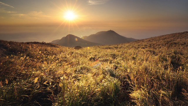 Grassy mountain sunset sunshine horizon free wallpaper for desktop - medium preview image