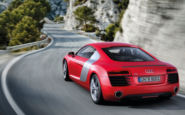 Red car mountain road trees free wallpaper for desktop - medium preview image