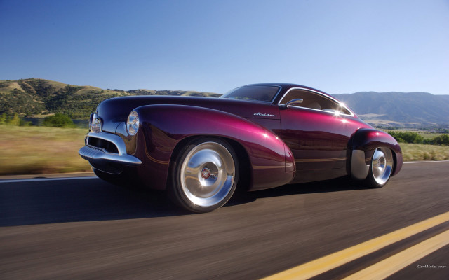 Purple car green hills mountains #2 free wallpaper for desktop - medium preview image